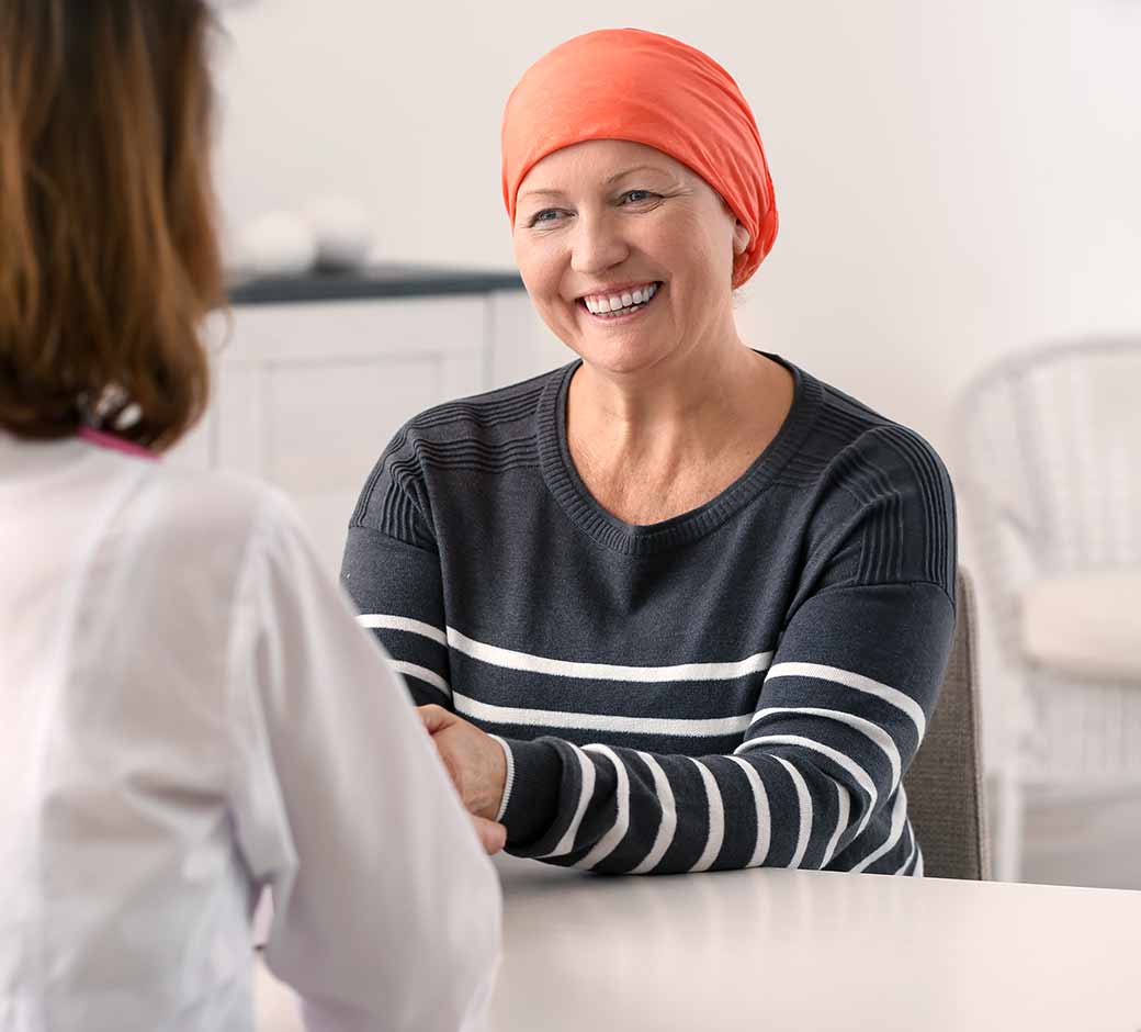 Oncology patient talking to doctor