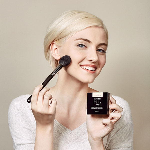 Step 3: Powder 
With a fluffy brush, dust loose powder over your T-zone to control oil and shine. 