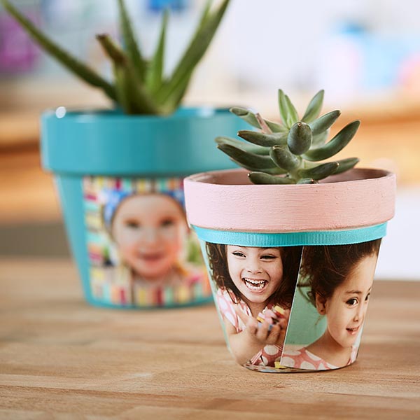 Finished DIY flower pots decorated with photos