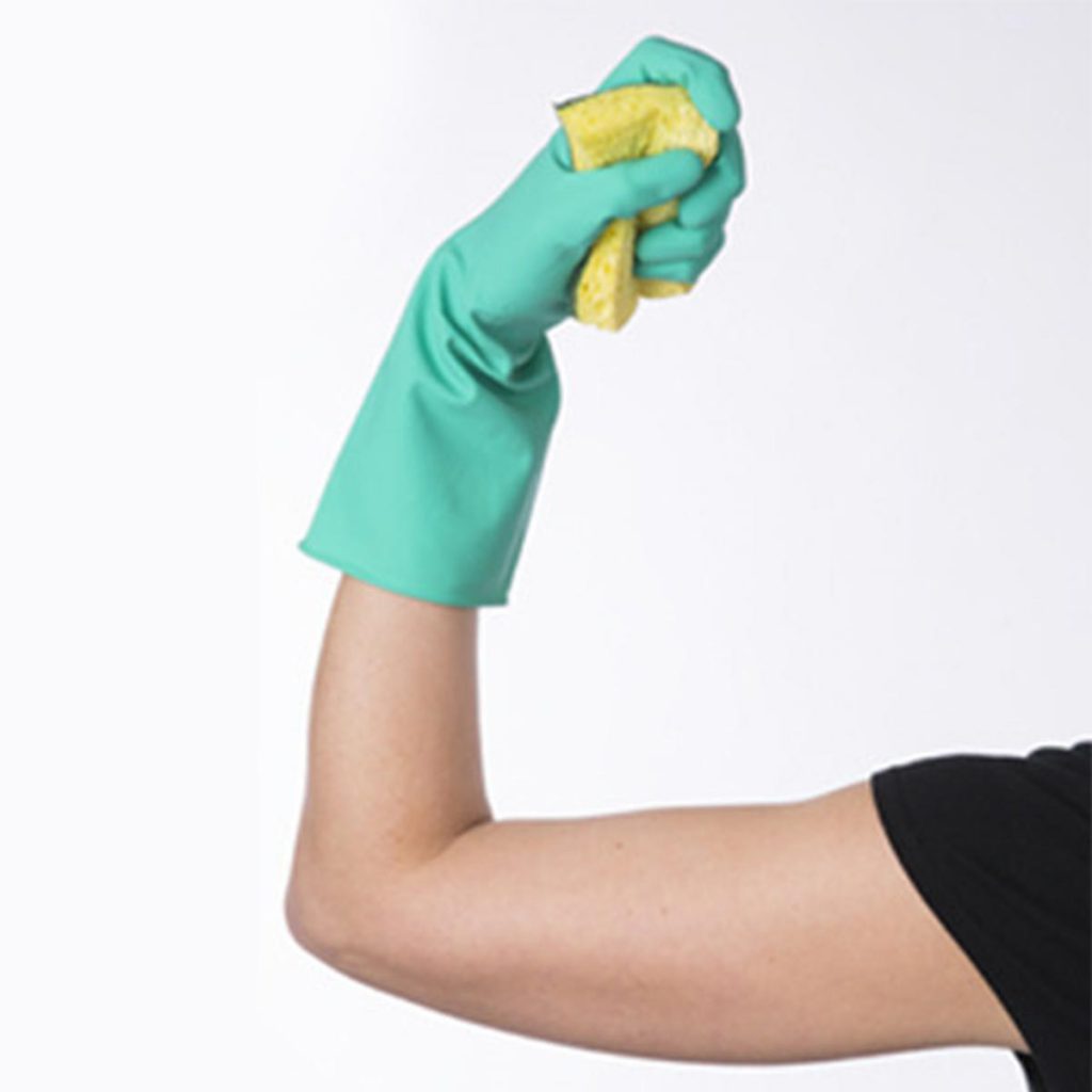 Person clenching a dish sponge with a cleaning glove on while flexing their bicep