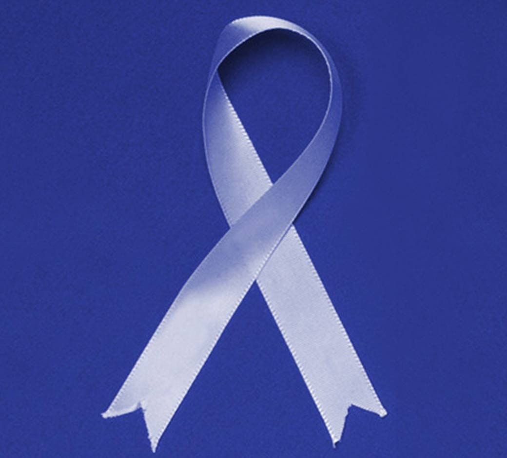 Blue cancer ribbon on blue background