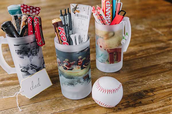Three Frosted Photo Steins stuffed with treats dad loves for a Father's Day gift