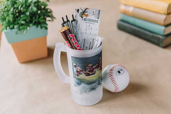 Frosted Photo Stein filled with candy, tickets to a baseball game, golf tees, and a baseball