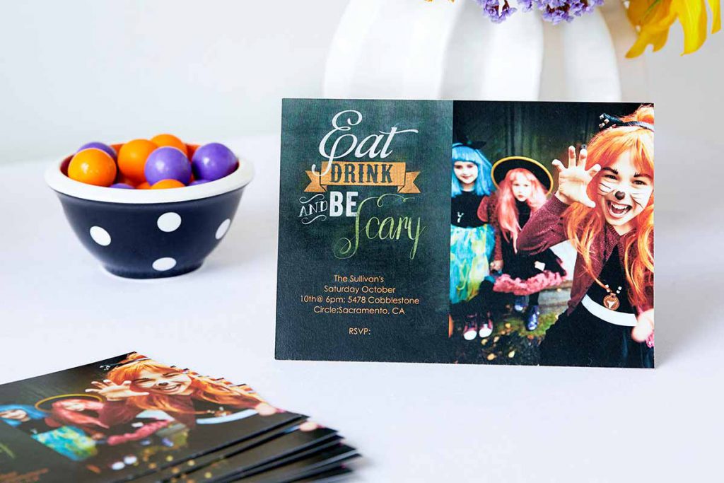 Photo invitation to a halloween party with that says "Eat, drink and be scary."