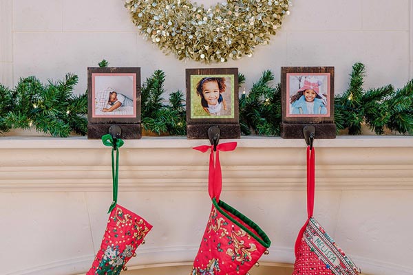 Place photo stocking holders on mantel and add your stockings.